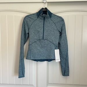 NWT Lululemon Always Alert 1/2 Zip
Heathered Petrol Blue size 4